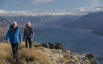 Cameron and wife, Suzy Amis, on Mount Alfred