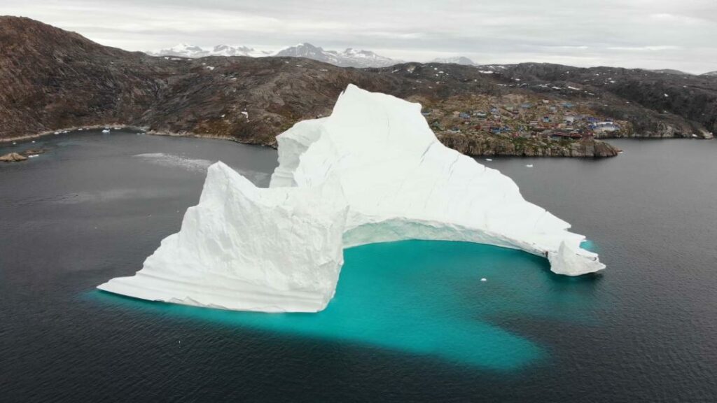 A huge iceberg is threatening a tiny village in Greenland