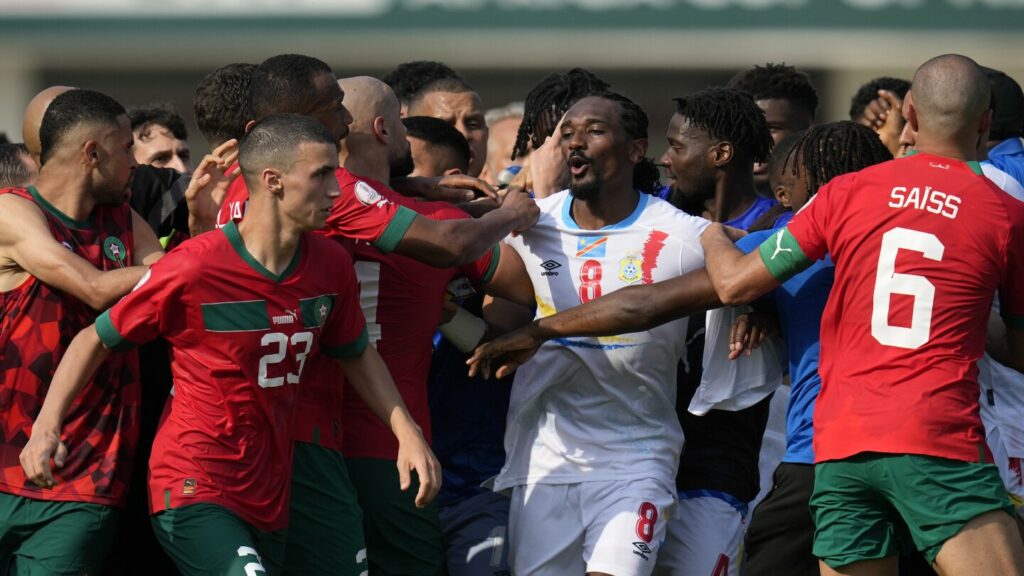Tempers flare in the heat at Africa Cup as Morocco and Congo draw 1-1. South Africa gets first win