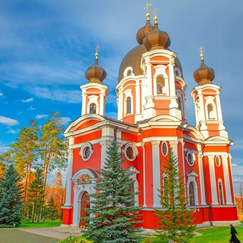 Beautiful Red-Colored Monastery In The Town Of Curchi, Moldova, Eastern Europe