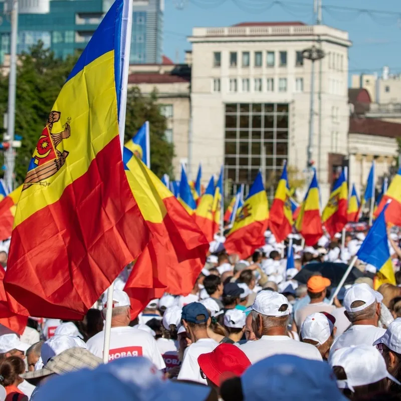 People Parading With Moldovan Flags Through The Streets Of Chisinau, Eastern Europe.jpg