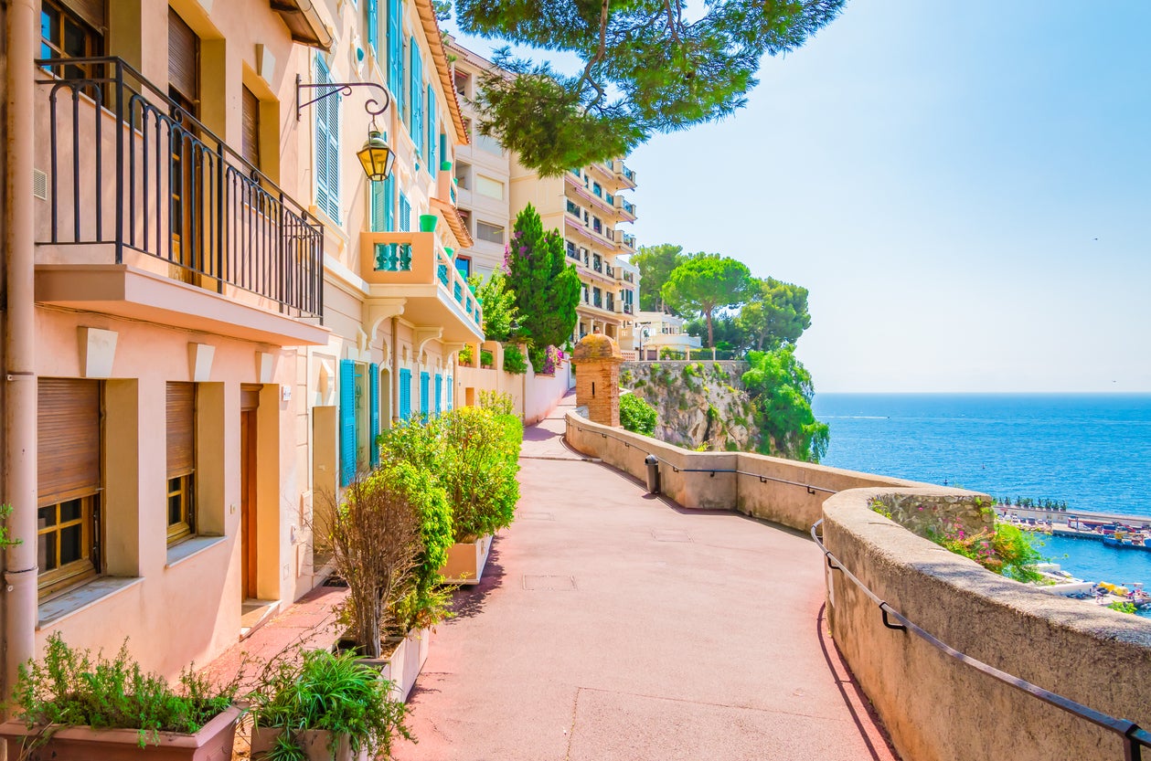 Pretty houses along the shore reflect the Mediterranean locale