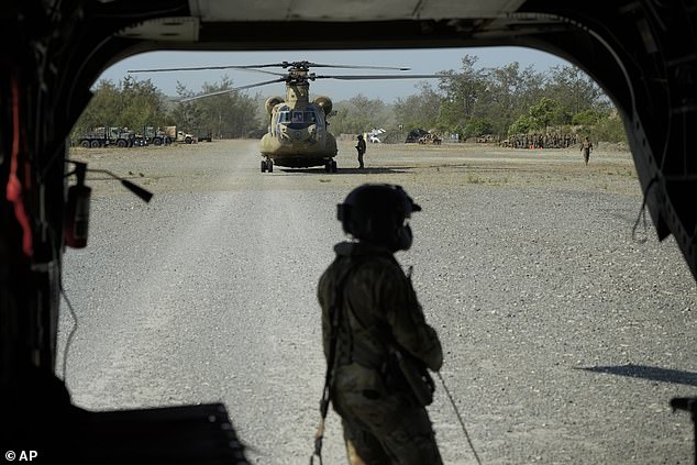 U.S. trooper prepares their U.S. Army CH-47 at Paredes Air Station at Pasuquin on May 6, 2024