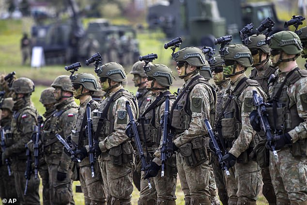 Lithuanian Army soldiers take part in a Lithuanian-Polish exercise in Lithuania on April 26