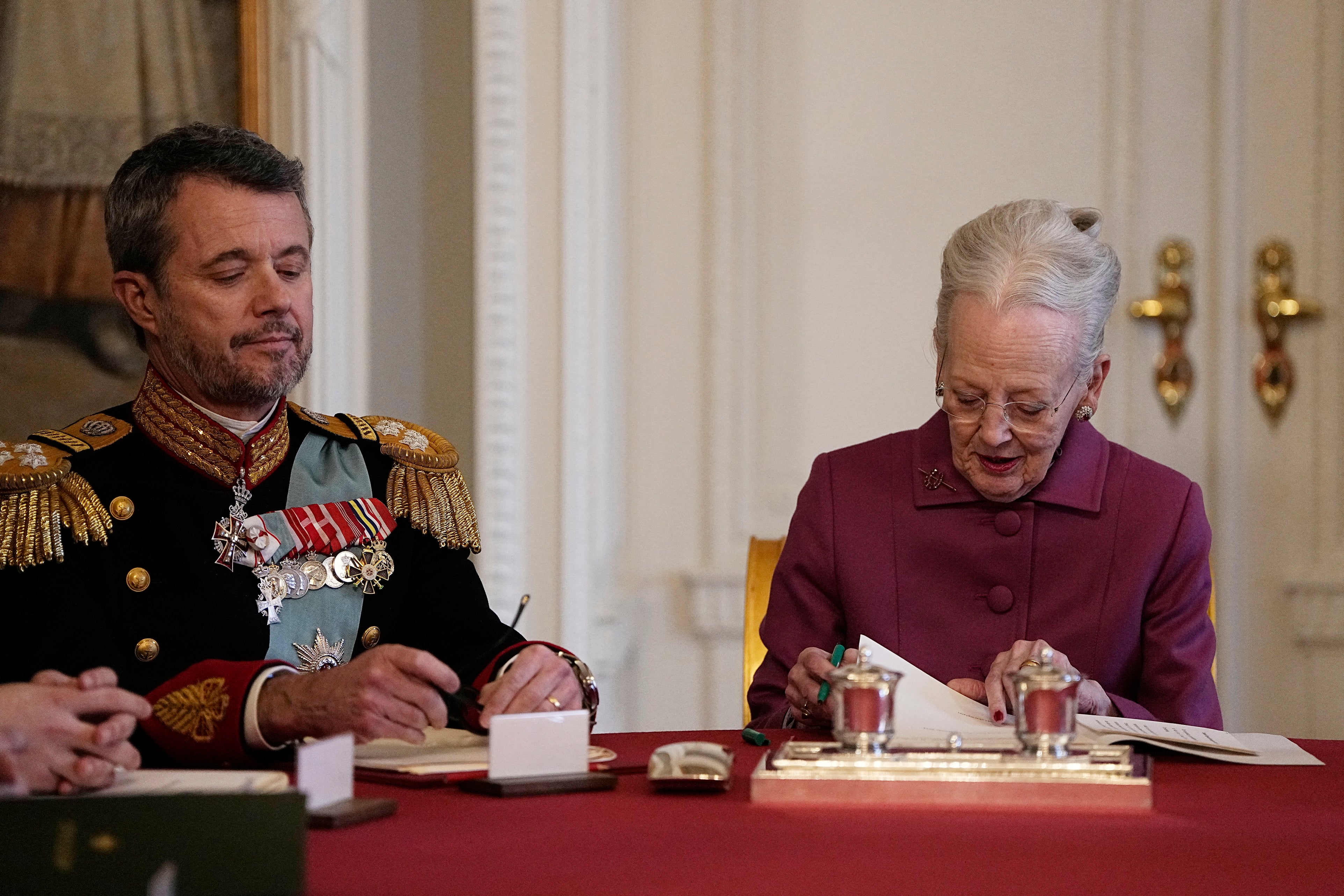 Queen Margrethe II of Denmark signs a declaration of abdication on Sunday