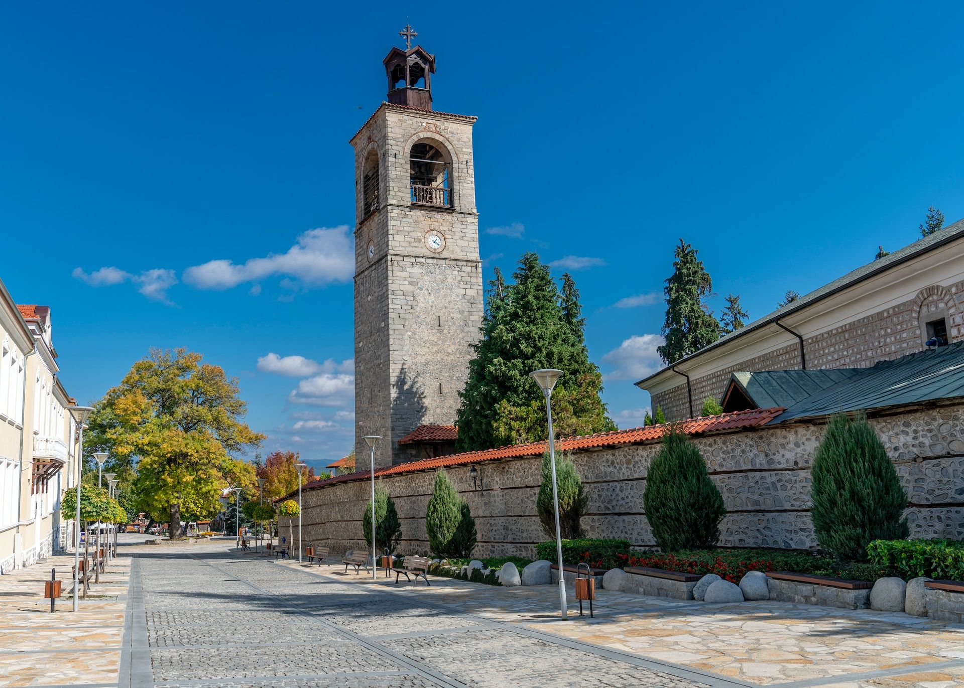 Street with a clock tower in Bansko, Bulgaria