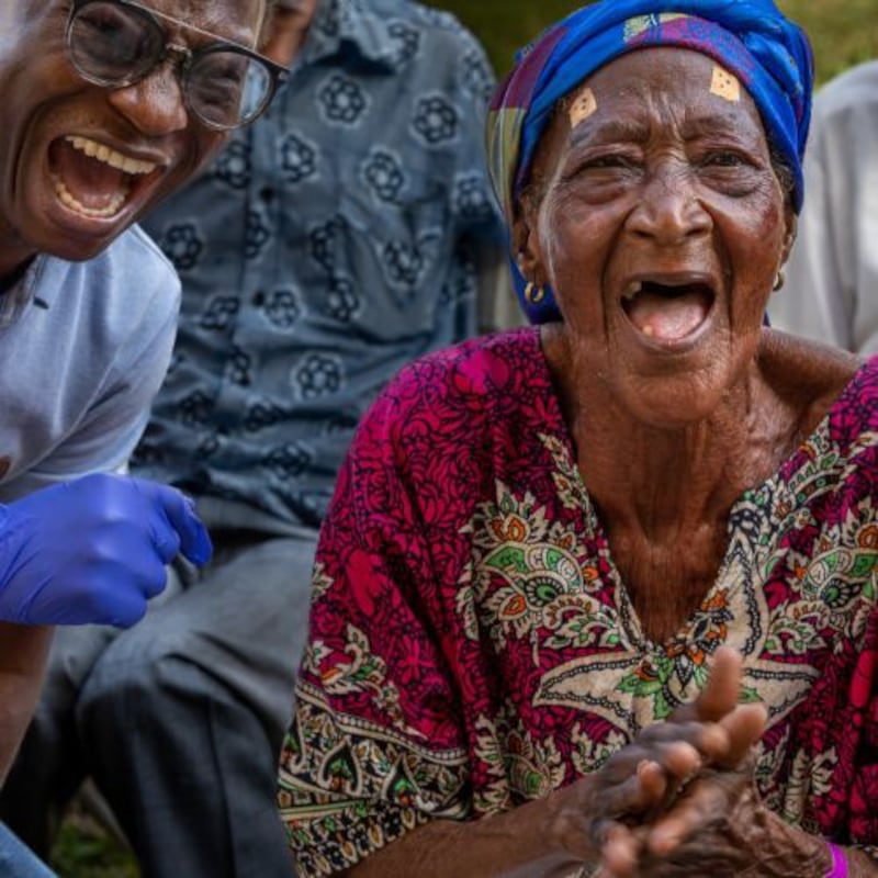 A patient rejoices with others upon regaining her sight in Wa, Ghana.