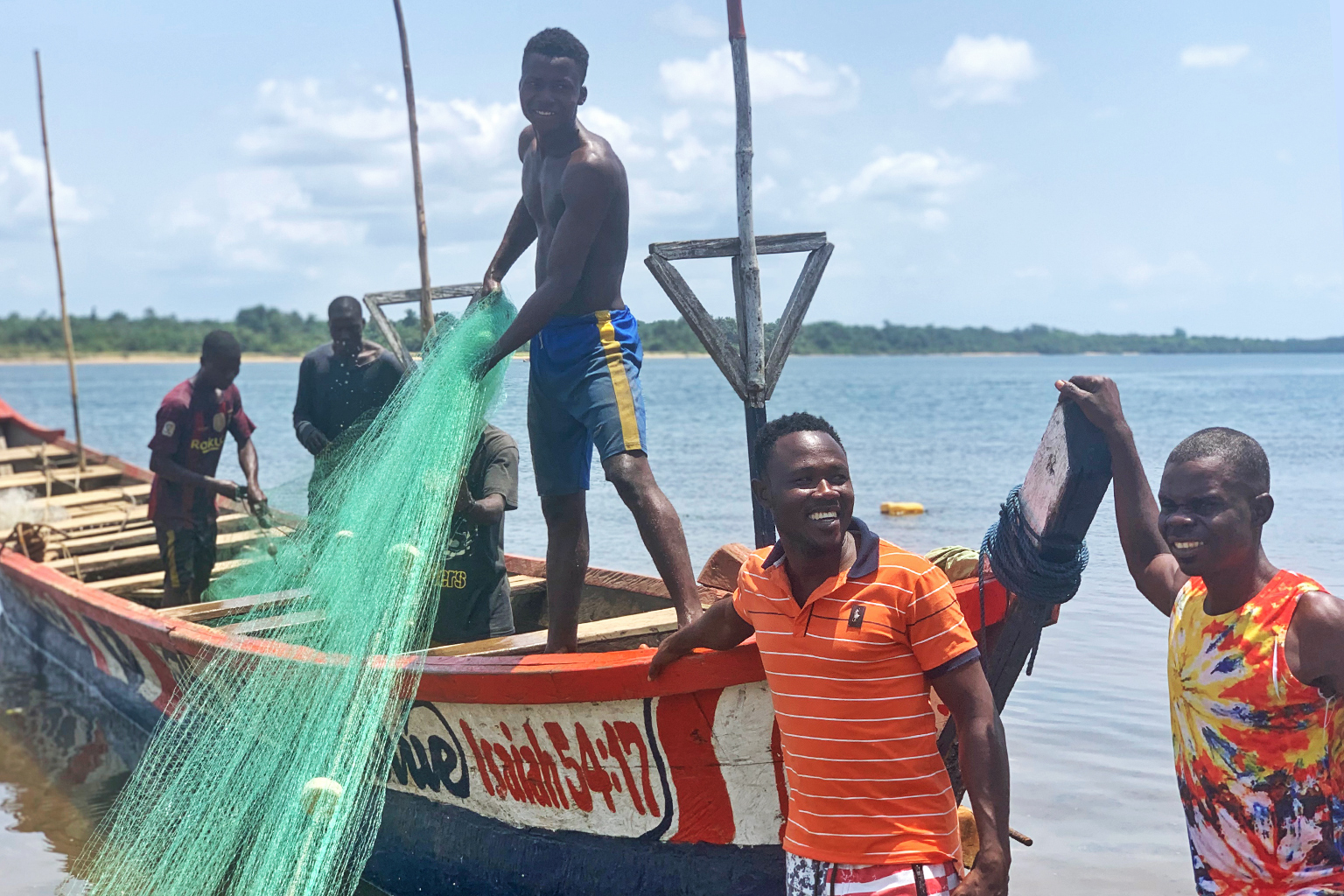 Fishermen in Marshall, Liberia, prepare nets
