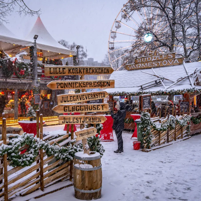 snowing at christmas market in oslo