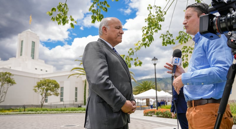 Elder Jorge F. Zeballos answers questions from a media member