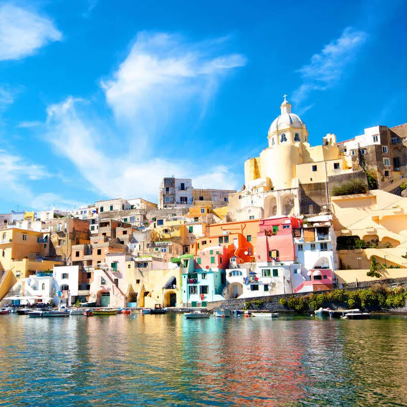Pastel Colored Town In The Island Of Procida, An Island Off The Mainland Amalfi Coast Near Naples, Campania, Southern Italy, Southern Mediterranean Europe