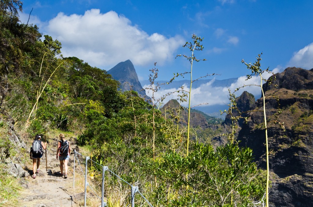 Two hikers on one of the many trails on Reunion Island.