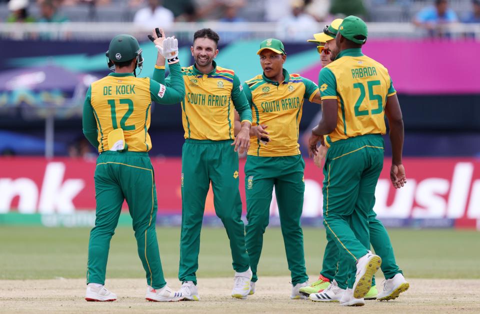 Keshav Maharaj of South Africa celebrates with teammates after dismissing Litton Das of Bangladesh during the ICC Men's T20 Cricket World Cup match between South Africa and Bangladesh at Nassau County International Cricket Stadium on June 10, 2024 in New York, New York.