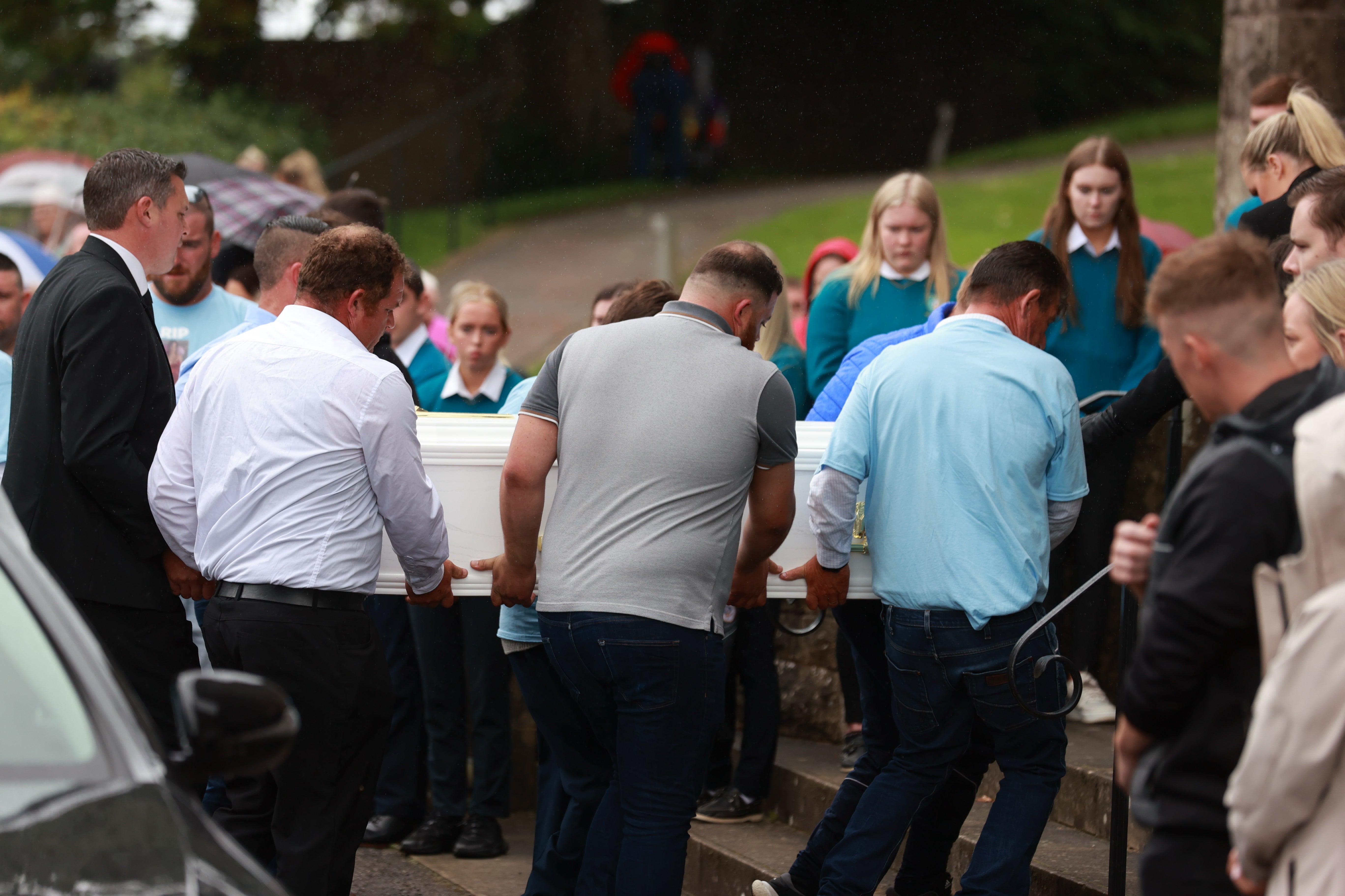 The coffin of Kiea McCann is carried into the Sacred Heart Chapel in Clones