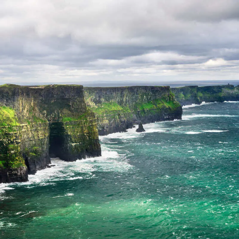 The Cliffs Of Moher Facing The Atlantic Sea In County Clare, West Coast Of Ireland, Western Europe
