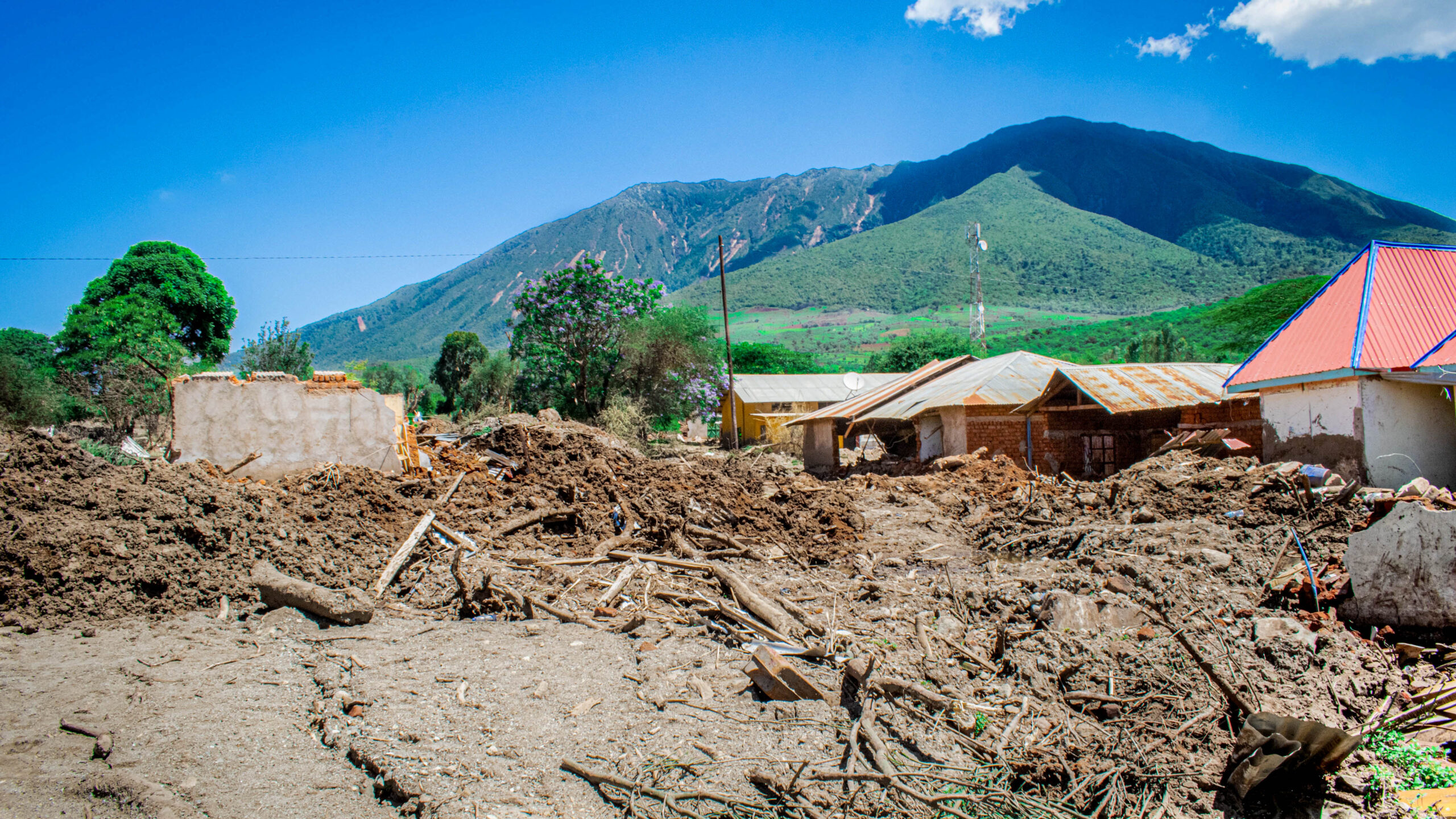 Rubble piled up by buildings shows the environmental destruction following deadly landslides in the Manyara region of Tanzania in December 2023. Photo courtesy of Amref Health Africa in Tanzania