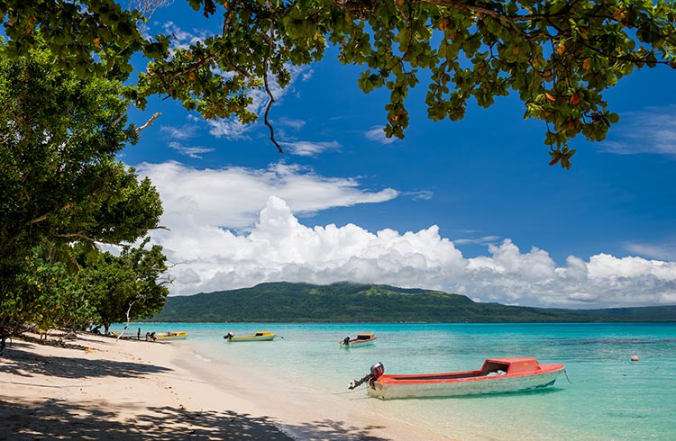 Boats on the beach of Pele Island, Port Vila, Vanuatu