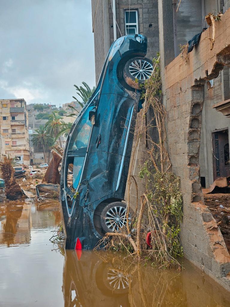 The force of the floodwater was strong enough to upend cars