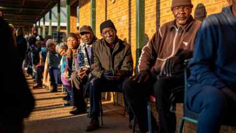 Voters wait in line in South Africa