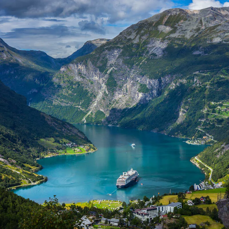 Aerial View Of A Cruise Ship Entering Geirangerfjord In Norway, Northern Europe, Scandinavia