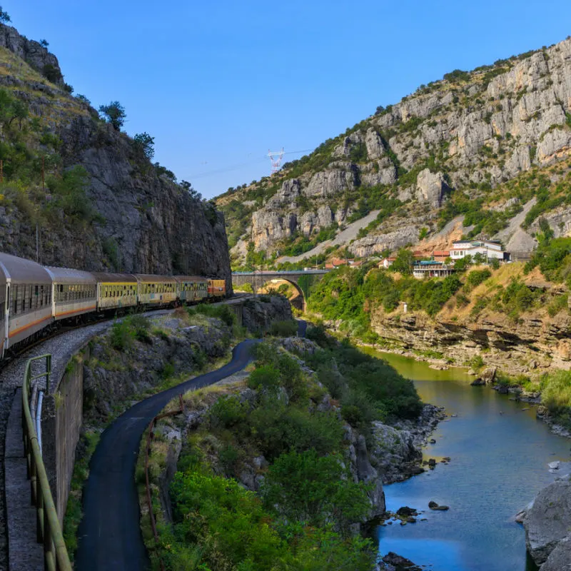 Train passing through mountains of Montenegro