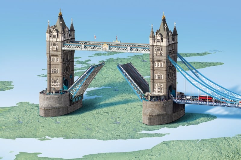 An illustration shows a map of the United Kingdom under a model of London Bridge in the raised position. Traffic is stopped leading up to the raised bridge, but there is no road on the other side of structure.