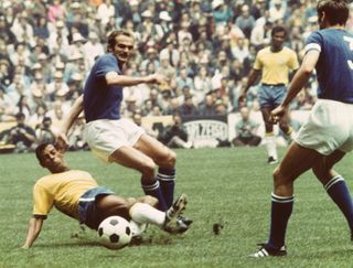 Brazil's Carlos Alberto tackles Italy's Sandro Mazzola in the 1970 World Cup final.