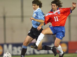 Chile's Marcelo Salas (right) competes with Uruguay's Pablo Garcia in the semi-finals of the 1999 Copa America.