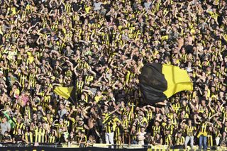 Peñarol fans cheer on their team in a derby against Nacional in April 2023.