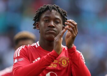 Kobbie Mainoo of Manchester United applauds the fans ahead of the Man Utd vs Fulham live stream