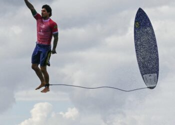 Why Olympic surfing events are in Tahiti, thousands of miles from Paris – NPR