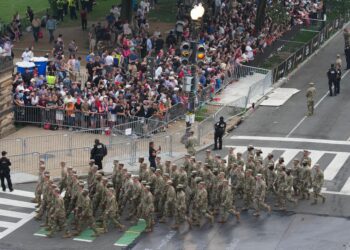 Military parade and No Kings protests: A split screen of a divided America – NPR