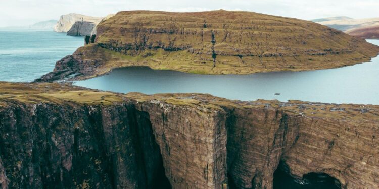 This Stunning Island Has a ‘Floating Lake’ Above the Sea—and It’s Called ‘Mother Nature’s Infinity Pool’ – Travel + Leisure