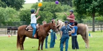 A horse therapy program in Namibia brings joy to children with learning disabilities – AP News