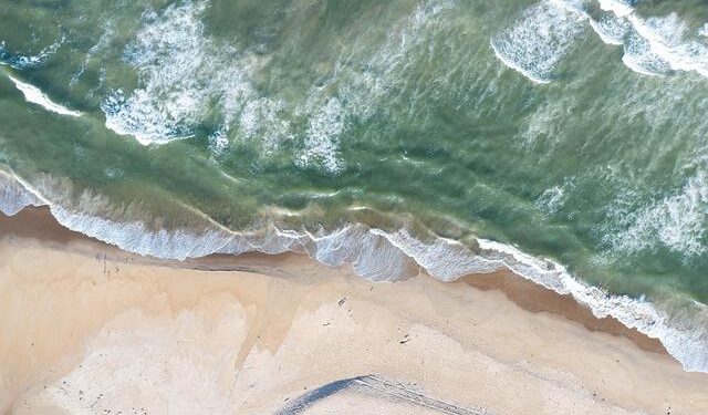 Breathtaking Aerial Perspectives of Eastern Ta’ū Island: Discover Your Coastal Paradise!
